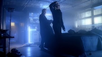 Movie still from “Madonna - Bad Girl” (1993), directed by David Fincher – Wide shot, Low angle