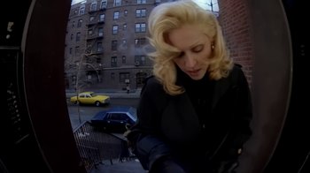 Movie still from “Madonna - Bad Girl” (1993), directed by David Fincher – Medium shot, Low angle