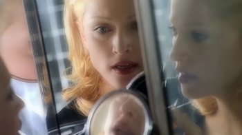 Movie still from “Madonna - Bad Girl” (1993), directed by David Fincher – Extreme Close Up shot, Overhead angle