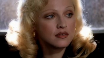 Movie still from “Madonna - Bad Girl” (1993), directed by David Fincher – Close Up shot, Overhead angle