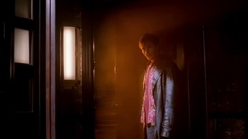 Movie still from “Madonna - Bad Girl” (1993), directed by David Fincher – Medium shot, Low angle