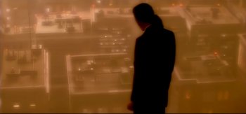 Movie still from “Michael Jackson - Who Is It” (1992), directed by David Fincher – Medium shot, High angle