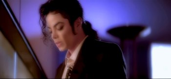 Movie still from “Michael Jackson - Who Is It” (1992), directed by David Fincher – Extreme Close Up shot, High angle