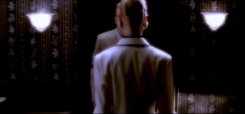 Movie still from “Michael Jackson - Who Is It” (1992), directed by David Fincher – Close Up shot, Over the shoulder angle