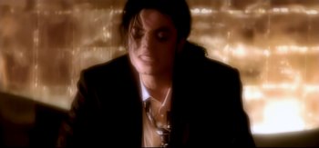 Movie still from “Michael Jackson - Who Is It” (1992), directed by David Fincher – Extreme Close Up shot, High angle
