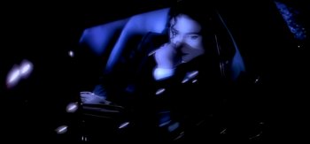 Movie still from “Michael Jackson - Who Is It” (1992), directed by David Fincher – Extreme Close Up shot, High angle