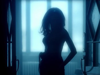 Movie still from “George Michael - Freedom! ’90” (1990), directed by David Fincher – Medium shot, Low angle