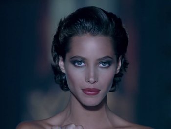 Movie still from “George Michael - Freedom! ’90” (1990), directed by David Fincher – Close Up shot, High angle