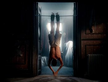 Movie still from “George Michael - Freedom! ’90” (1990), directed by David Fincher – Wide shot, Low angle