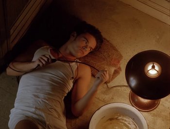 Movie still from “George Michael - Freedom! ’90” (1990), directed by David Fincher – Medium shot, Overhead angle