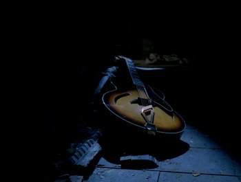 Movie still from “George Michael - Freedom! ’90” (1990), directed by David Fincher – Wide shot, Overhead angle