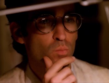 Movie still from “Billy Idol - Cradle Of Love” (1990), directed by David Fincher – Extreme Close Up shot, High angle