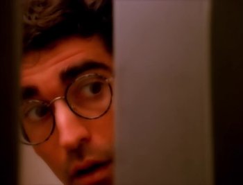 Movie still from “Billy Idol - Cradle Of Love” (1990), directed by David Fincher – Extreme Close Up shot, High angle