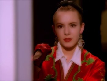 Movie still from “Billy Idol - Cradle Of Love” (1990), directed by David Fincher – Close Up shot, High angle