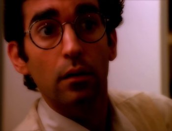 Movie still from “Billy Idol - Cradle Of Love” (1990), directed by David Fincher – Close Up shot, High angle