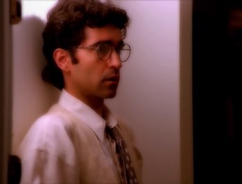 Movie still from “Billy Idol - Cradle Of Love” (1990), directed by David Fincher – Close Up shot, Low angle