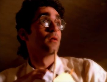 Movie still from “Billy Idol - Cradle Of Love” (1990), directed by David Fincher – Extreme Close Up shot, High angle