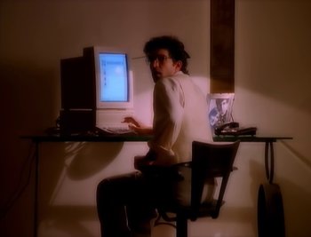 Movie still from “Billy Idol - Cradle Of Love” (1990), directed by David Fincher – Medium shot, High angle