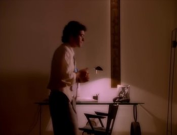 Movie still from “Billy Idol - Cradle Of Love” (1990), directed by David Fincher – Medium shot, High angle