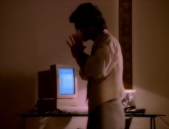 Movie still from “Billy Idol - Cradle Of Love” (1990), directed by David Fincher – Medium shot, High angle