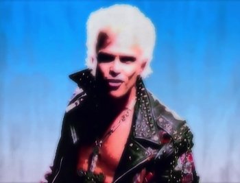 Movie still from “Billy Idol - Cradle Of Love” (1990), directed by David Fincher – Close Up shot, Low angle