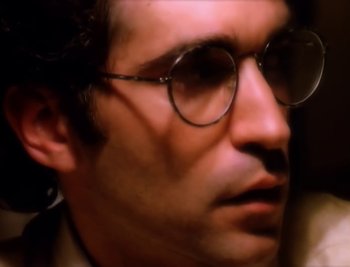 Movie still from “Billy Idol - Cradle Of Love” (1990), directed by David Fincher – Extreme Close Up shot, High angle