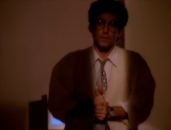 Movie still from “Billy Idol - Cradle Of Love” (1990), directed by David Fincher – Medium shot, High angle