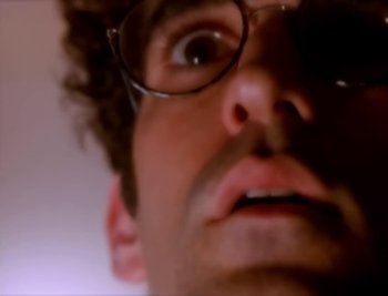 Movie still from “Billy Idol - Cradle Of Love” (1990), directed by David Fincher – Extreme Close Up shot, Low angle