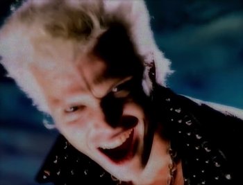 Movie still from “Billy Idol - Cradle Of Love” (1990), directed by David Fincher – Extreme Close Up shot, Overhead angle