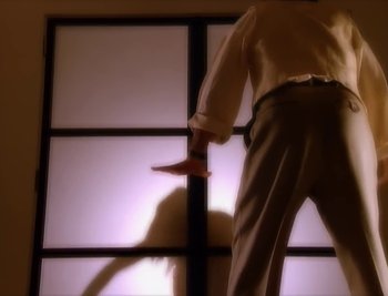 Movie still from “Billy Idol - Cradle Of Love” (1990), directed by David Fincher – Extreme Close Up shot, Low angle