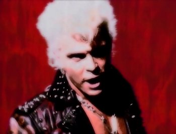 Movie still from “Billy Idol - Cradle Of Love” (1990), directed by David Fincher – Extreme Close Up shot, Low angle