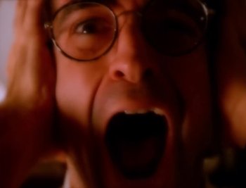 Movie still from “Billy Idol - Cradle Of Love” (1990), directed by David Fincher – Extreme Close Up shot, High angle