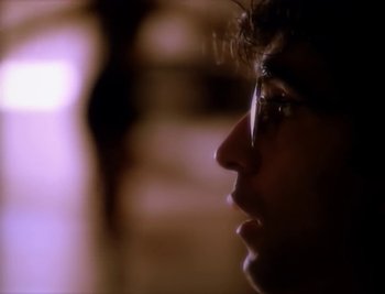 Movie still from “Billy Idol - Cradle Of Love” (1990), directed by David Fincher – Extreme Close Up shot, Low angle