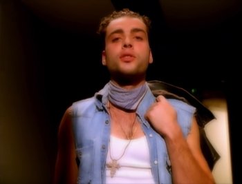 Movie still from “Billy Idol - Cradle Of Love” (1990), directed by David Fincher – Close Up shot, Low angle