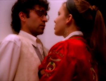 Movie still from “Billy Idol - Cradle Of Love” (1990), directed by David Fincher – Extreme Close Up shot, Overhead angle