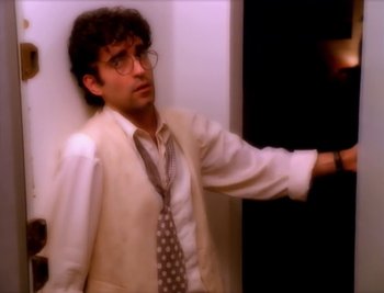 Movie still from “Billy Idol - Cradle Of Love” (1990), directed by David Fincher – Medium shot, High angle