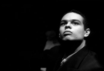 Movie still from “Madonna - Vogue” (1990), directed by David Fincher – Close Up shot, Low angle