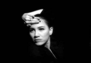 Movie still from “Madonna - Vogue” (1990), directed by David Fincher – Extreme Close Up shot, Low angle