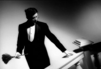 Movie still from “Madonna - Vogue” (1990), directed by David Fincher – Medium shot, Low angle