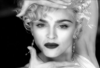 Movie still from “Madonna - Vogue” (1990), directed by David Fincher – Extreme Close Up shot, Overhead angle