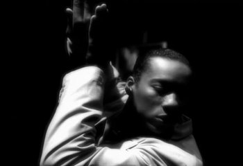 Movie still from “Madonna - Vogue” (1990), directed by David Fincher – Extreme Close Up shot, Low angle