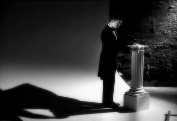 Movie still from “Madonna - Vogue” (1990), directed by David Fincher – Wide shot, Low angle