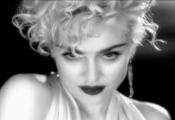 Movie still from “Madonna - Vogue” (1990), directed by David Fincher – Close Up shot, Low angle