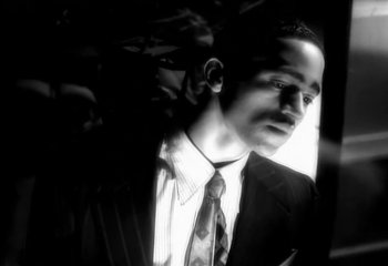 Movie still from “Madonna - Vogue” (1990), directed by David Fincher – Close Up shot, Low angle