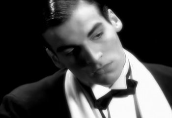 Movie still from “Madonna - Vogue” (1990), directed by David Fincher – Extreme Close Up shot, Low angle