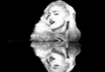 Movie still from “Madonna - Vogue” (1990), directed by David Fincher – Close Up shot, Overhead angle