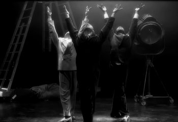 Movie still from “Madonna - Vogue” (1990), directed by David Fincher – Wide shot, Low angle