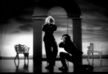 Movie still from “Madonna - Vogue” (1990), directed by David Fincher – Wide shot, Low angle