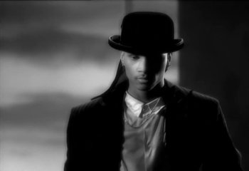 Movie still from “Madonna - Vogue” (1990), directed by David Fincher – Close Up shot, Low angle