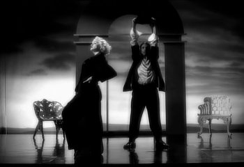 Movie still from “Madonna - Vogue” (1990), directed by David Fincher – Wide shot, Low angle